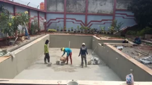 Pembuatan plastering dan waterproofing